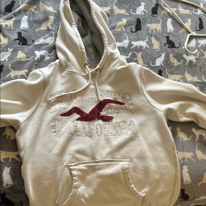 Hollister Cream Hoodie with Red Logo